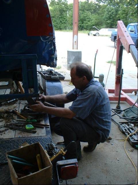 Fixing a broken axel.